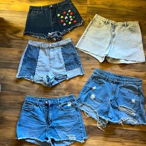 Five pairs Shein women’s cut off jean shorts. All size large, great condition!